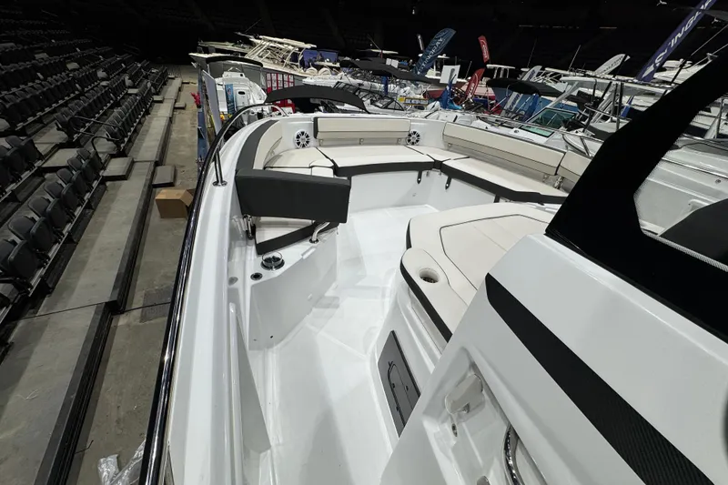 Slide: The Image of 2026 Jeanneau Leader 10.5 CC boat interior at a showroom display. - 17