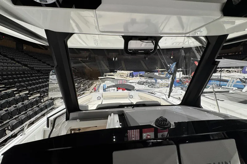 Slide: The Image of Interior view of 2026 Jeanneau Leader 10.5 CC at a boat show. - 9