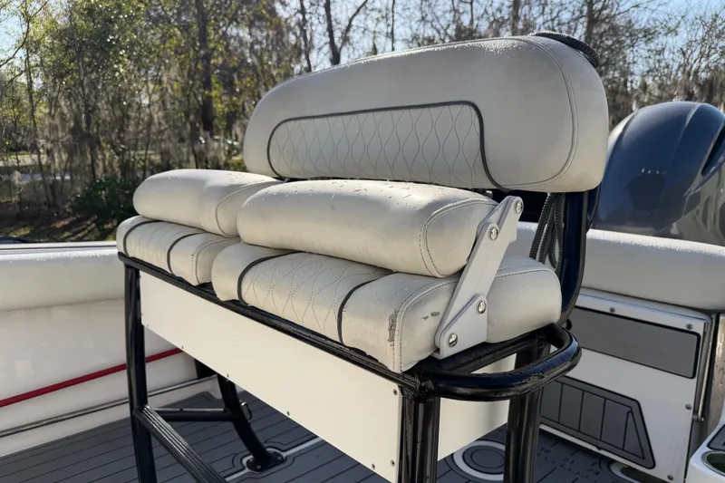 Slide: The Image of 2020 Sportsman Open 212 Center Console boat seat with cushioned backrest. - 14