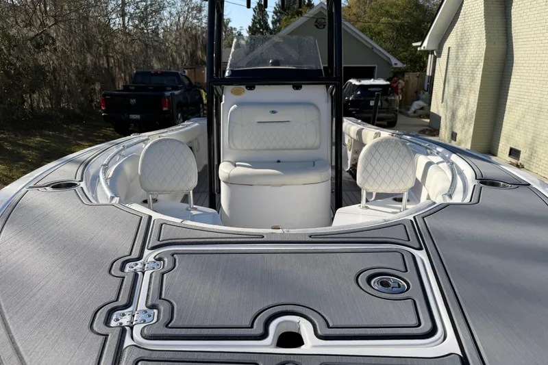 Slide: The Image of 2020 Sportsman Open 212 Center Console boat with sleek seating and modern design. - 15