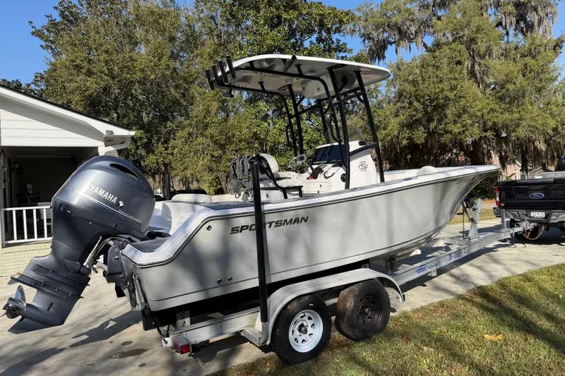 Slide: The Image of 2020 Sportsman Open 212 Center Console boat on trailer with Yamaha outboard motor. - 3