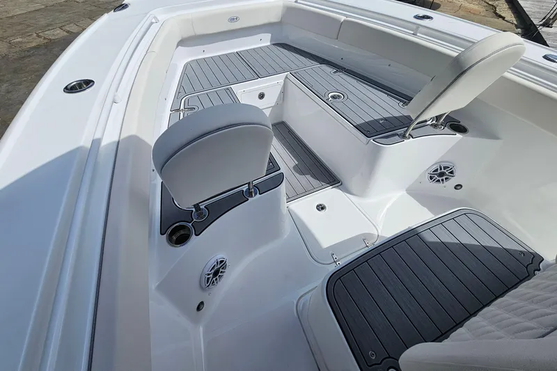 Slide: The Image of 2025 Sea Hunt Ultra 275 SE boat interior with seating and deck details. - 21