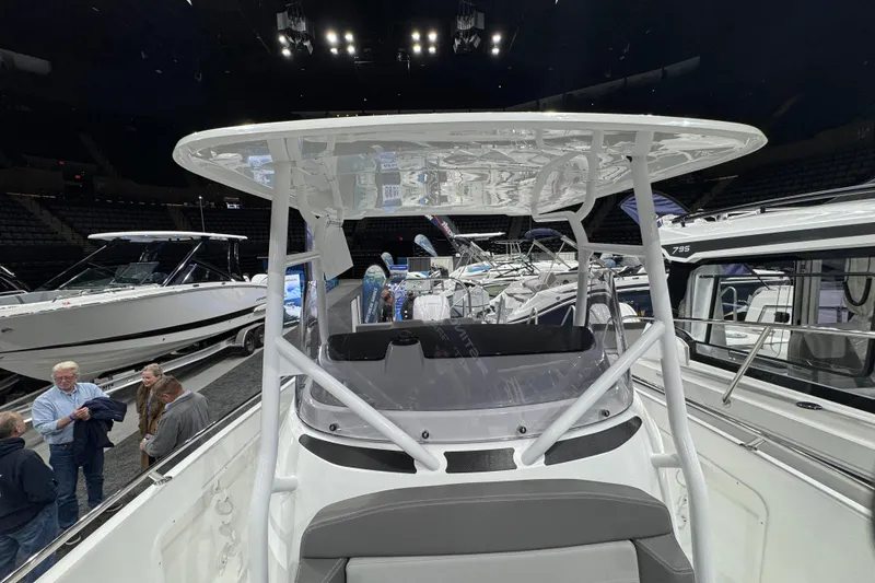 Slide: The Image of 2026 Jeanneau Cap Camarat 7.5 CC Serie 3 showcased at a boat exhibition. - 13