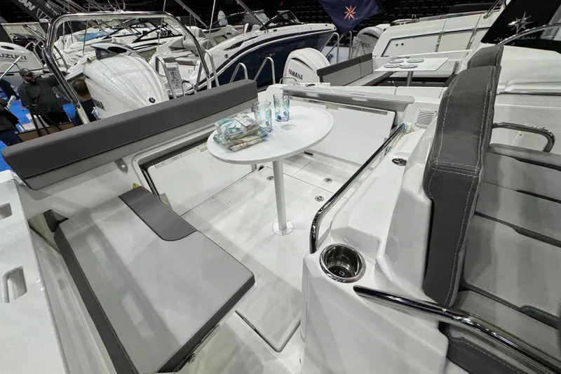 Slide: The Image of Interior of 2026 Jeanneau Cap Camarat 7.5 CC Serie 3 boat with seating and table. - 15
