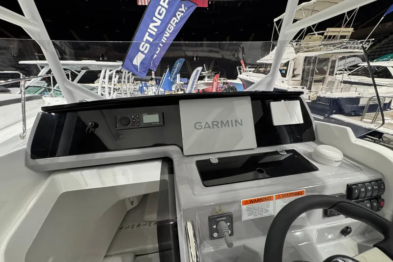 Slide: The Image of 2026 Jeanneau Cap Camarat 7.5 CC Serie 3 dashboard with Garmin navigation system. - 4