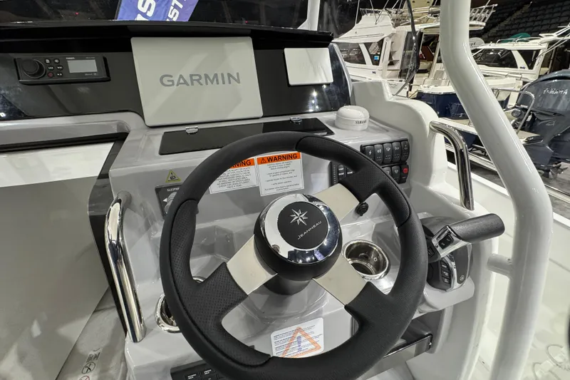 Slide: The Image of Steering console of 2026 Jeanneau Cap Camarat 7.5 CC Serie 3 with Garmin navigation. - 5