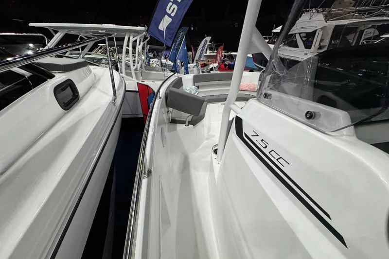 Slide: The Image of 2026 Jeanneau Cap Camarat 7.5 CC Serie 3 boat at a marine exhibition. - 7
