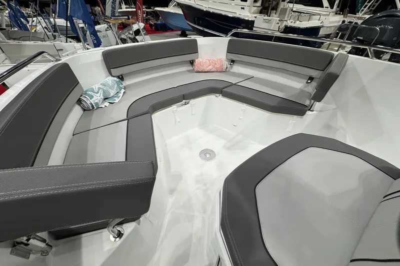 Slide: The Image of 2026 Jeanneau Cap Camarat 7.5 CC Serie 3 boat interior with cushioned seating. - 8