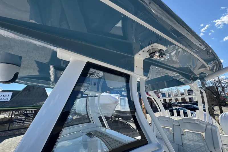 Slide: The Image of 2026 Tidewater 320 CC Adventure boat interior with sleek design and modern features. - 18