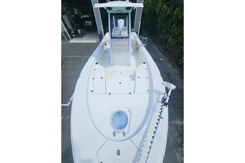 Slide: The Image of 2022 Blue Wave 2800 Pure Hybrid boat, white deck, spacious layout, modern design. - 1