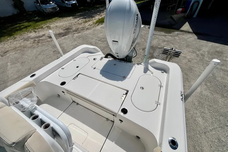 Slide: The Image of 2022 Blue Wave 2800 Pure Hybrid boat deck with Yamaha outboard motor. - 9