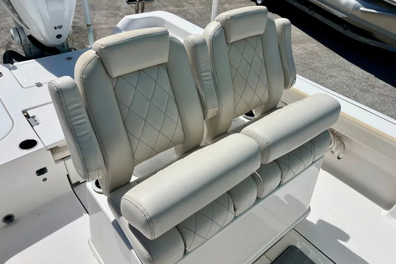 Slide: The Image of Luxury seating on 2022 Blue Wave 2800 Pure Hybrid boat, featuring elegant diamond stitching. - 15