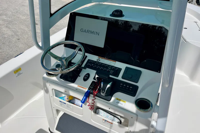 Slide: The Image of 2022 Blue Wave 2800 Pure Hybrid boat console with Garmin navigation system. - 16