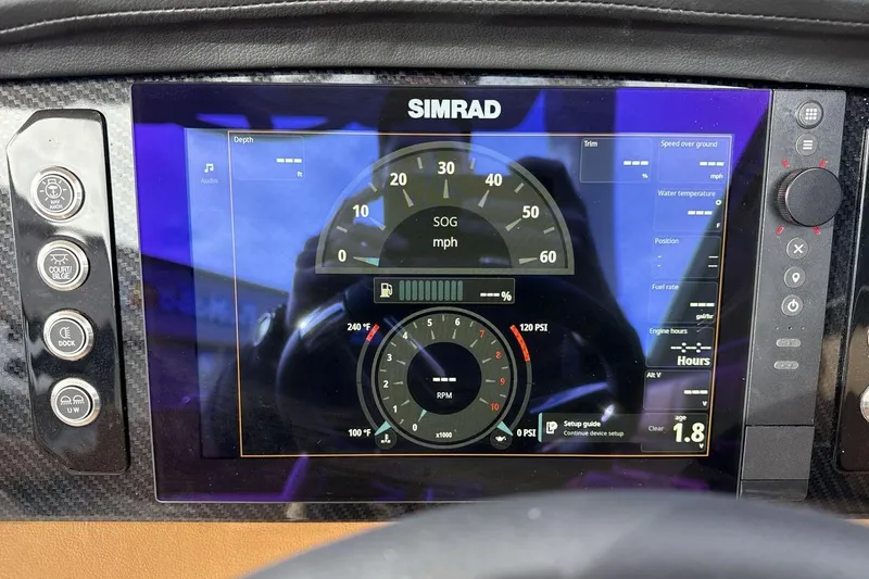 Slide: The Image of Simrad display on 2026 Chaparral GTS 6 showing speed, RPM, and engine data. - 15