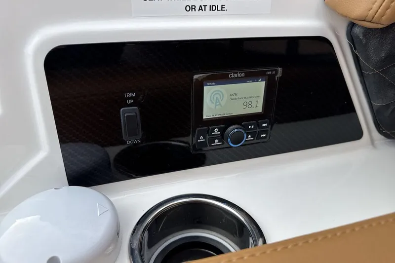 Slide: The Image of 2026 Chaparral GTS 6 dashboard with Clarion radio and trim controls. - 25