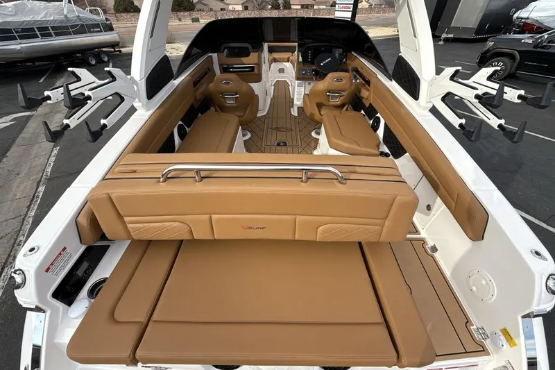 Slide: The Image of 2026 Chaparral GTS 6 boat interior with tan leather seating and modern design. - 9