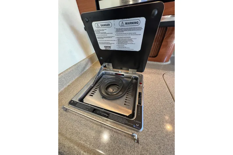 Slide: The Image of Kenyon stove in 2006 Sea Ray 290 Amberjack boat galley. - 16