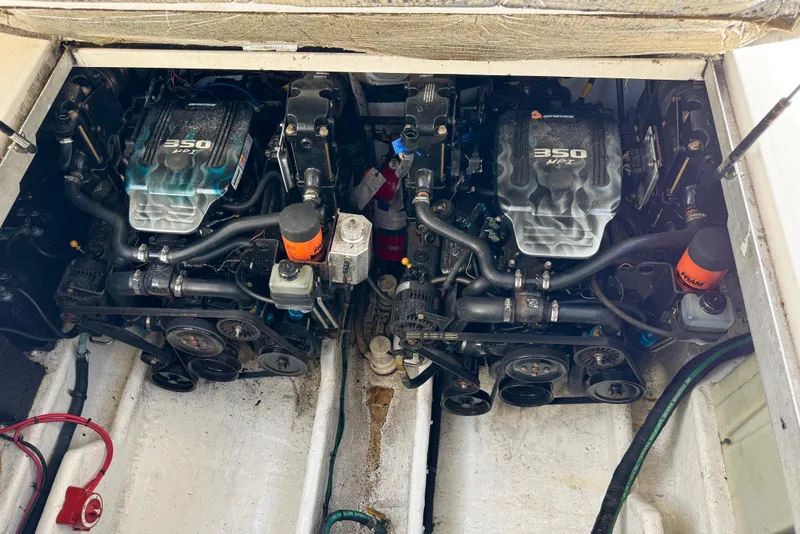 Slide: The Image of Engine compartment of a 2006 Sea Ray 290 Amberjack with twin 350 MPI engines. - 38