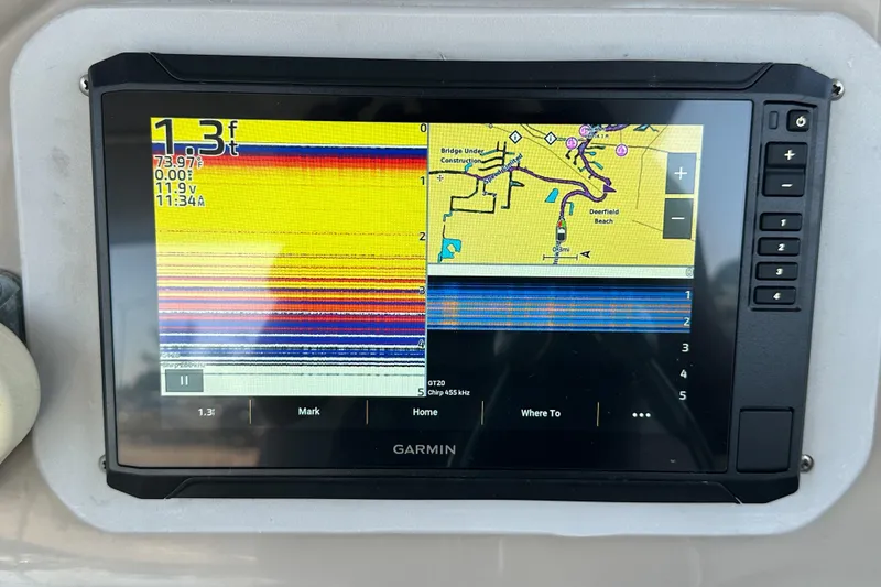 Slide: The Image of Garmin navigation display on 2006 Sea Ray 290 Amberjack, showing depth and map details. - 9
