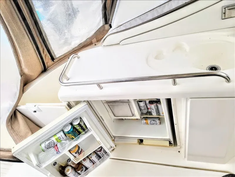 Slide: The Image of Fridge on 2000 Cruisers Yachts 3672 Express filled with drinks. - 20