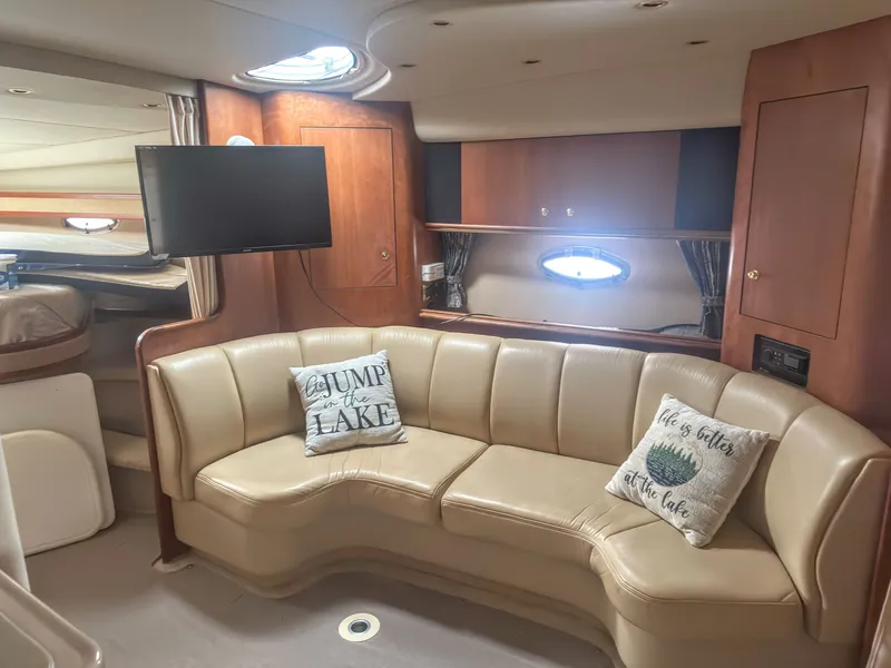 Slide: The Image of Interior of 2000 Cruisers Yachts 3672 Express with leather sofa and TV. - 40