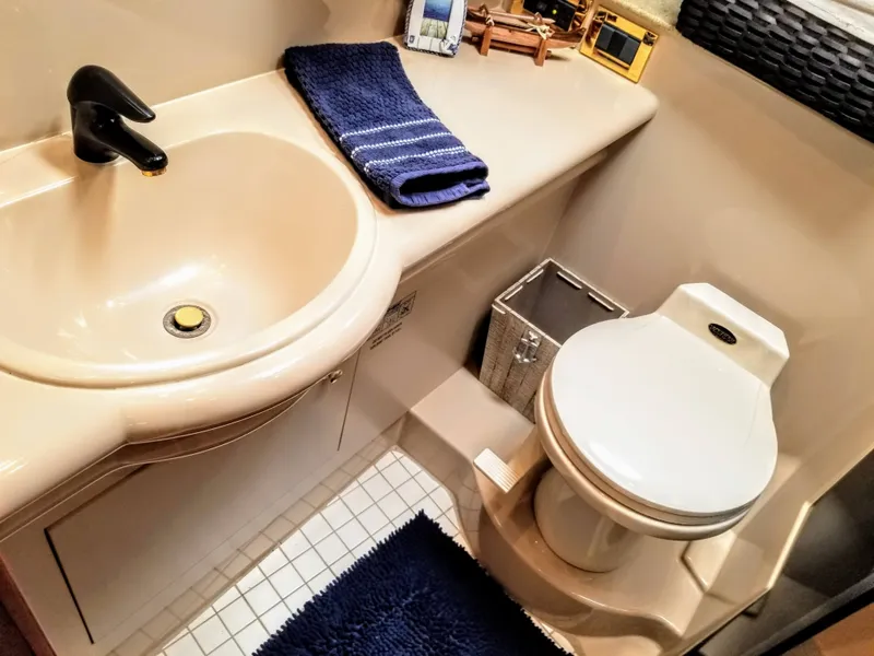 Slide: The Image of Bathroom of the 2000 Cruisers Yachts 3672 Express. - 8