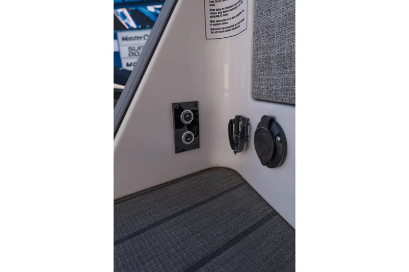 Slide: The Image of Interior controls and outlets of 2025 Balise Helix 24C boat. - 15