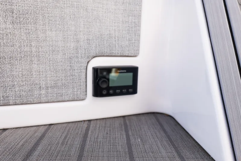 Slide: The Image of Control panel in a 2025 Balise Helix 24C boat interior, featuring modern design elements. - 17