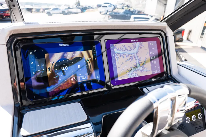 Slide: The Image of Simrad navigation display in 2025 Balise Helix 24C boat cockpit, showing speed and map data. - 33