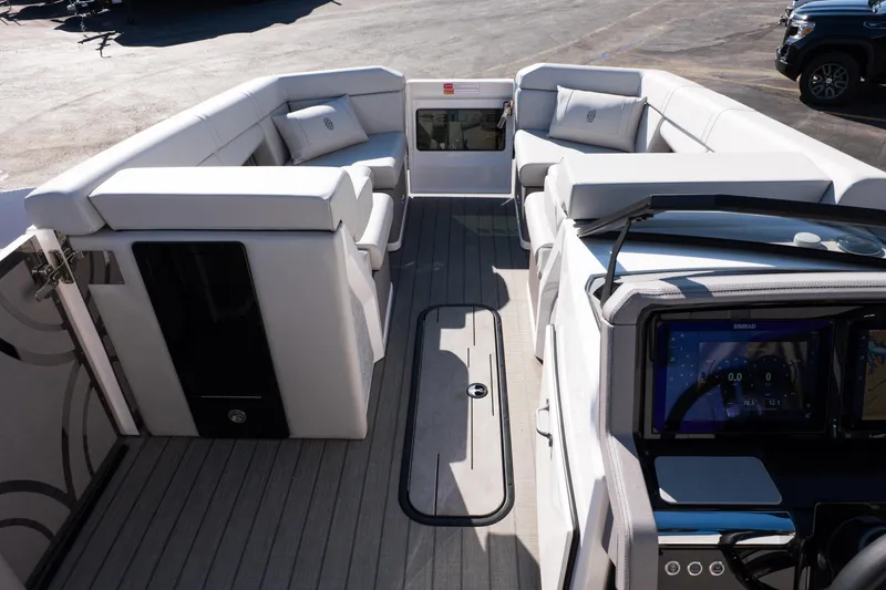 Slide: The Image of Luxurious interior of 2025 Balise Helix 24C boat with modern seating and navigation system. - 34
