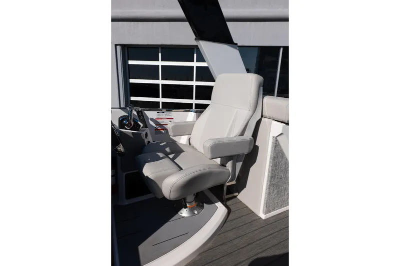 Slide: The Image of Captain's chair on 2025 Balise Helix 24C boat, featuring sleek design and comfortable seating. - 37