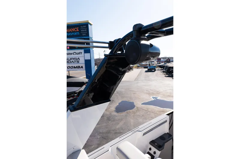 Slide: The Image of 2025 Balise Helix 24C boat with sleek black tower and speaker system. - 40