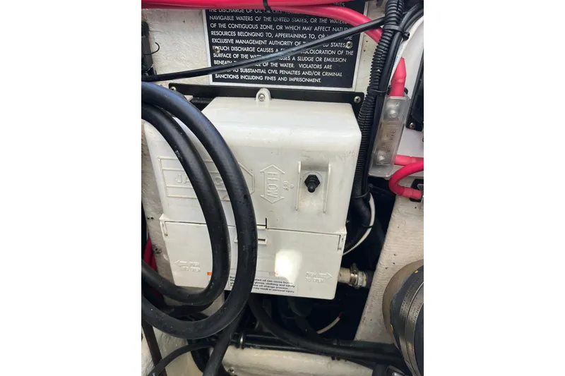 Slide: The Image of Electrical panel and wiring inside a 1998 Phoenix 32 Tournament boat. - 27