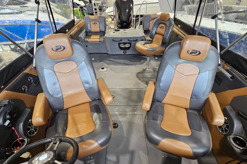 Slide: The Image of 2019 Princecraft Platinum SE 227 boat interior with luxurious seating and modern design. - 10