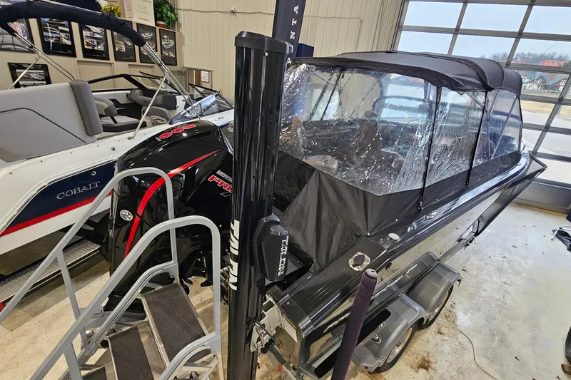 Slide: The Image of 2019 Princecraft Platinum SE 227 boat with Mercury engine in showroom. - 7