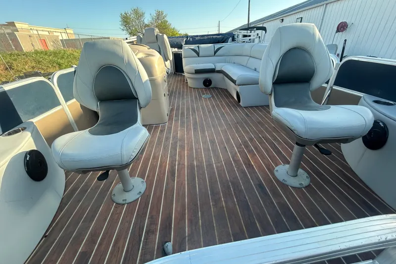 Slide: The Image of Interior of a 2016 Berkshire STS Salt edition boat with cushioned seating. - 17
