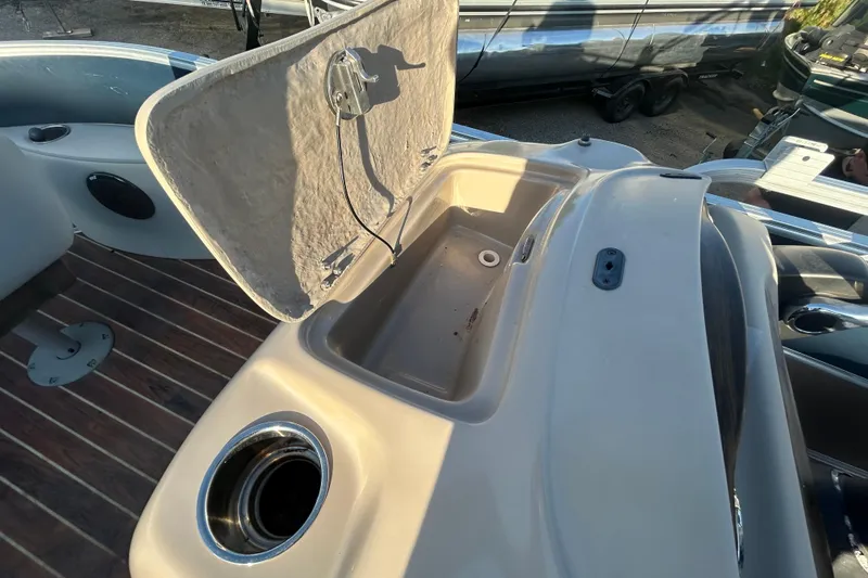 Slide: The Image of Open storage compartment on 2016 Berkshire STS Salt edition boat deck. - 19