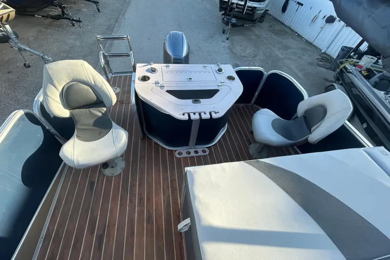 Slide: The Image of 2016 Berkshire STS Salt edition boat interior with seating and control panel. - 24