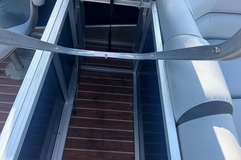 Slide: The Image of Interior view of a 2016 Berkshire STS Salt edition boat with seating and flooring. - 25