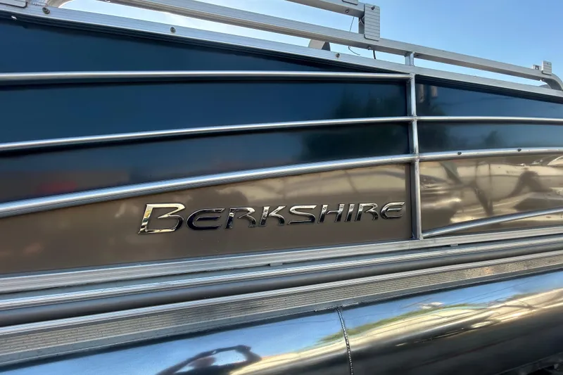 Slide: The Image of 2016 Berkshire STS Salt Edition boat side view with logo and metallic finish. - 30