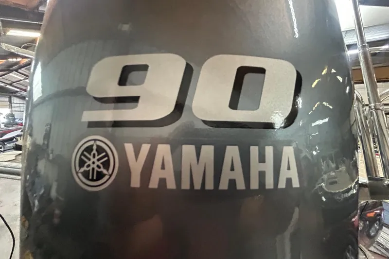 Slide: The Image of Close-up of Yamaha 90 engine on 2016 Berkshire STS Salt edition boat. - 5