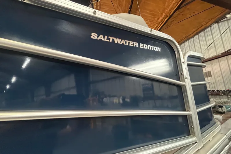 Slide: The Image of 2016 Berkshire STS Saltwater Edition boat in a warehouse setting. - 7