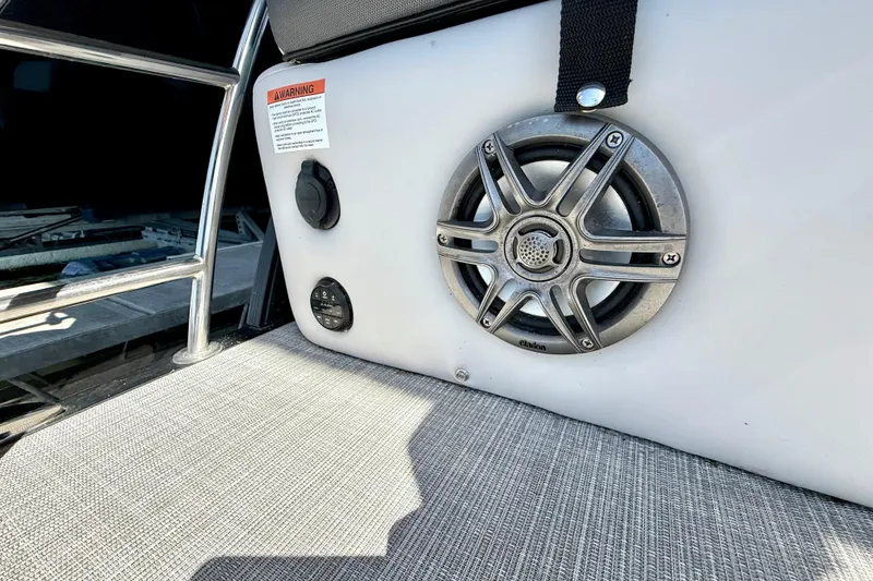 Slide: The Image of Speaker and controls on 2022 Harris Sunliner 250 boat interior. - 23