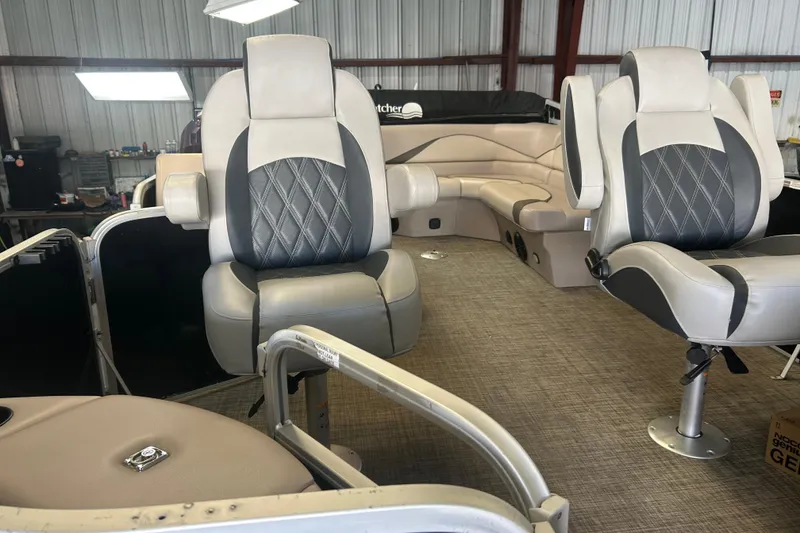 Slide: The Image of 2018 SunCatcher V20 Fish boat interior with plush seating and modern design. - 13