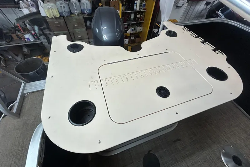 Slide: The Image of 2018 SunCatcher V20 Fish boat deck with built-in measuring board and cup holders. - 18