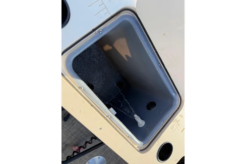 Slide: The Image of Livewell compartment on a 2018 SunCatcher V20 Fish boat, featuring water inlet. - 39