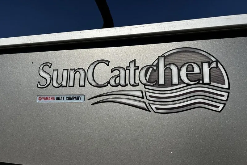 Slide: The Image of SunCatcher V20 Fish 2018 boat logo with Yamaha Boat Company branding. - 9