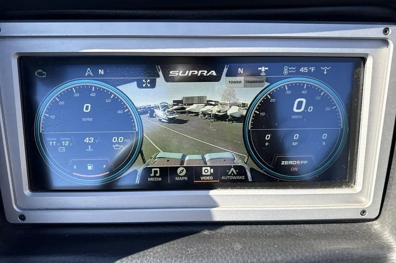 Slide: The Image of 2021 Supra SA 450 dashboard display showing RPM, speed, and navigation features. - 15