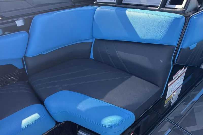 Slide: The Image of Blue and black seating in 2021 Supra SA 450 boat interior. - 17