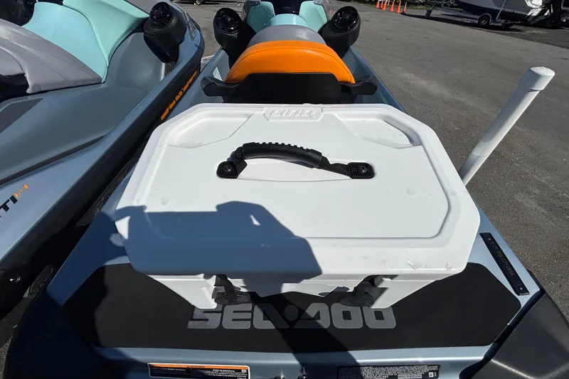 Slide: The Image of 2023 Sea-Doo GTI 130 with storage compartment, featuring sleek design and vibrant colors. - 18